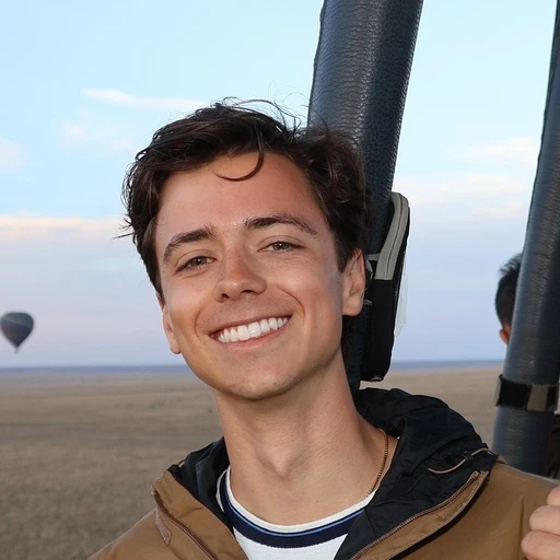 Adam Smith smiling during a hot-air balloon ride